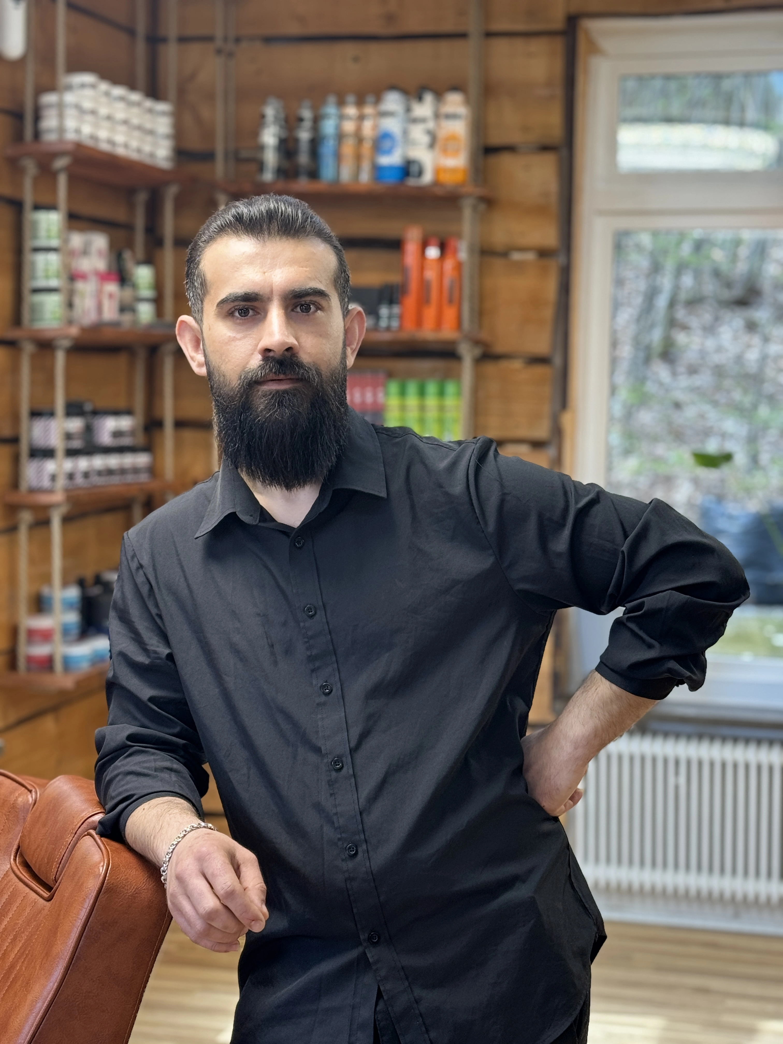 Ousama, grundare av Mustasch Barbershop i Ronneby